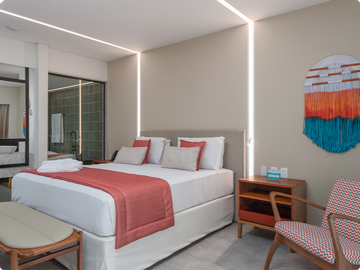 Suíte moderna e confortável no Japaratinga Lounge Resort,
decorada para proporcionar uma experiência relaxante e
sofisticada. 